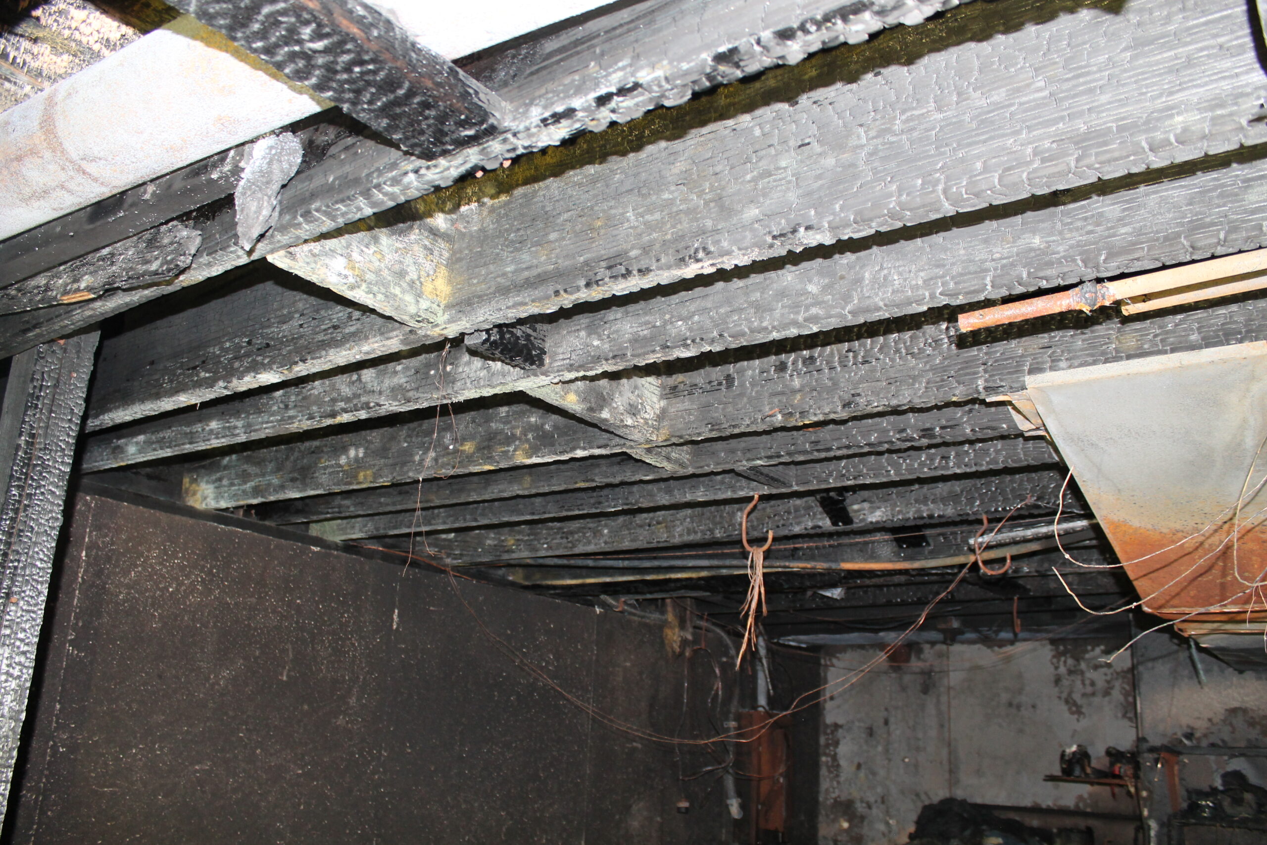 Interior view of ceiling damage done due to fire in a residential home.