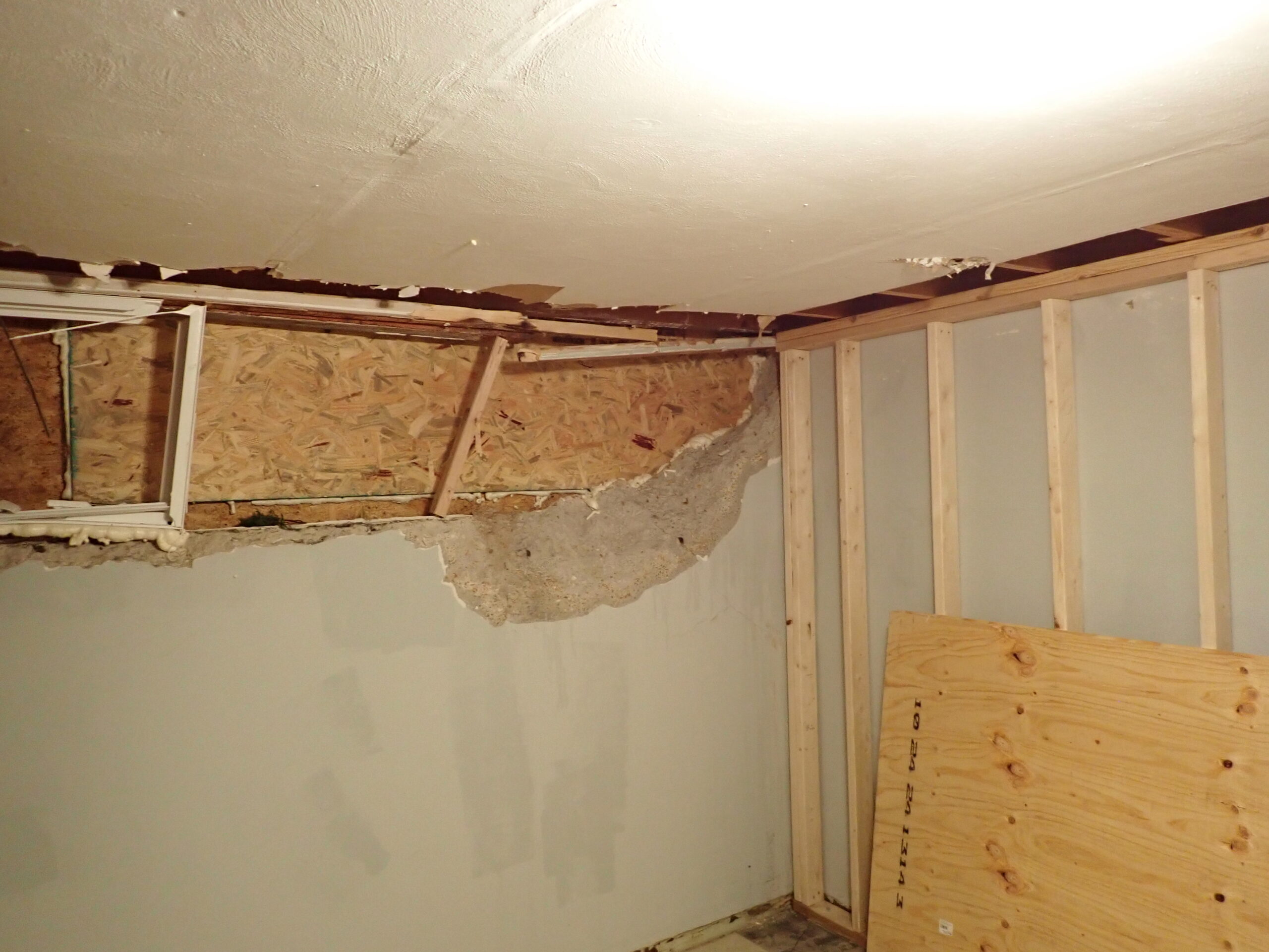 Damage done to inside of garage due to a car hitting it.