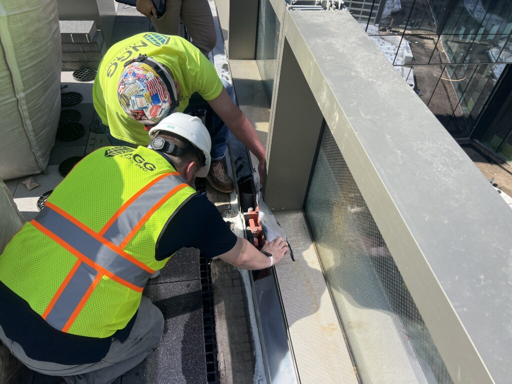 2 G&W team members testing the membrane