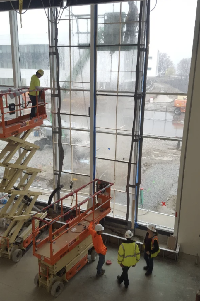 Mid America Testing Lab and G&W Engineering Employees testing the Facade of the Kansas City Airport