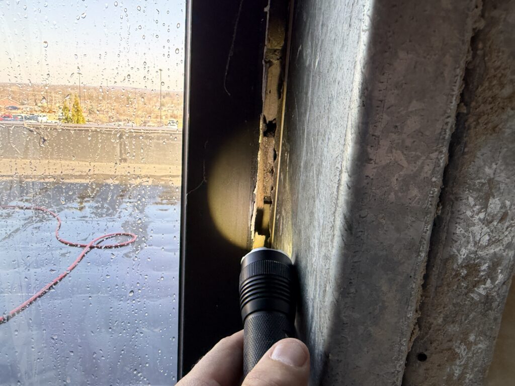 flashlight testing seal on hospital window
