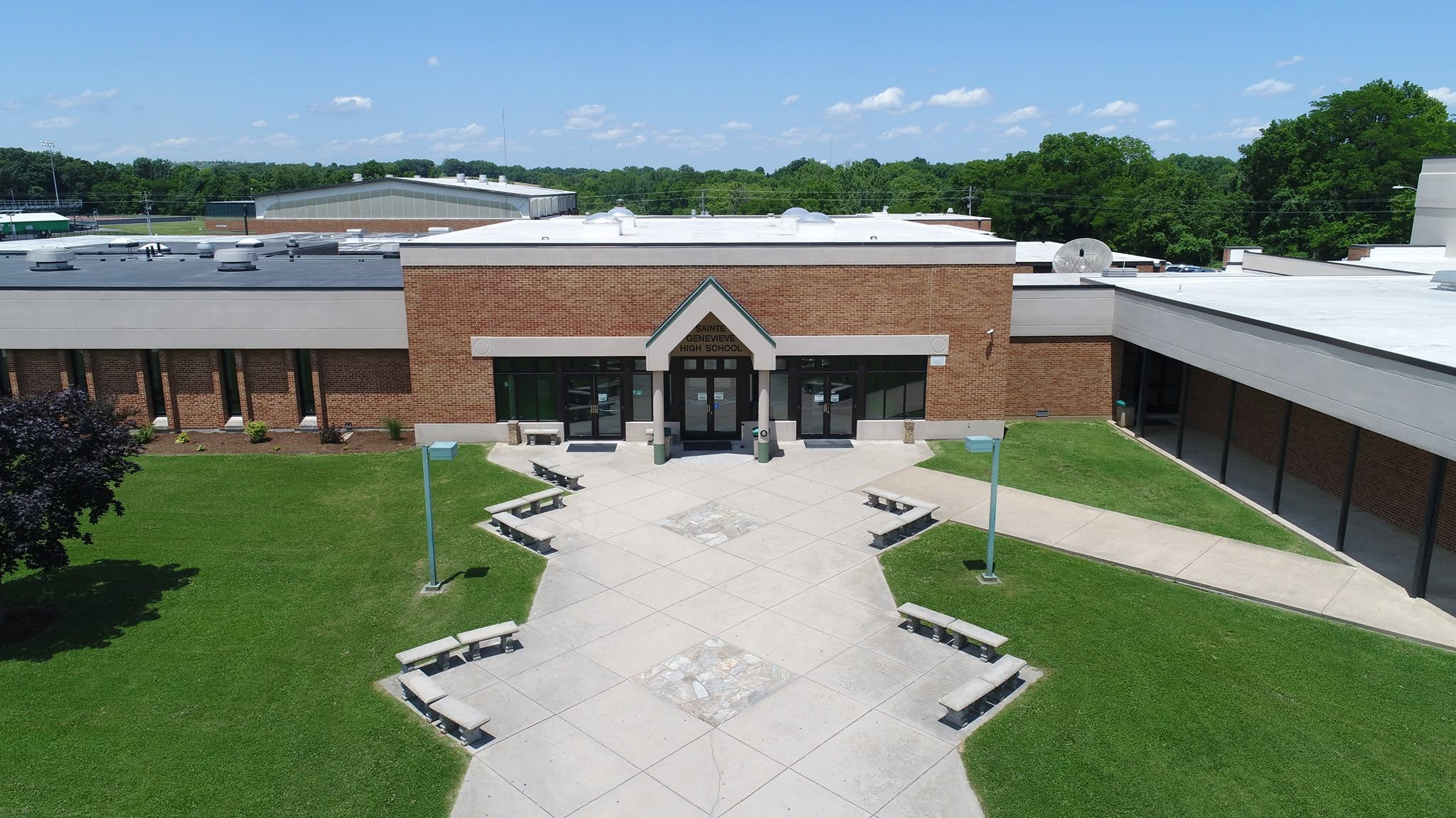 2 story front entrance with stone walkway to Ste. Genevieve High School in Ste. Genevieve, MO