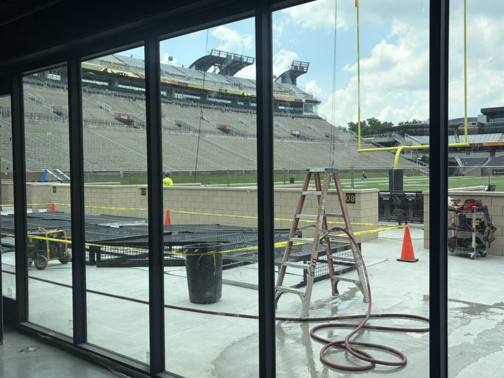 Ladder and hose set up on deck of MU Memorial Stadium