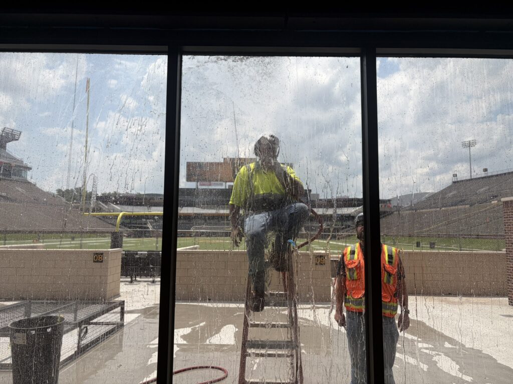 G&W employee water testing stadium windows